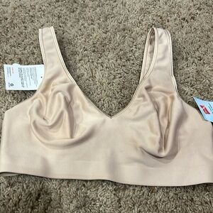 Nude Hanes bra size large.   New with tags